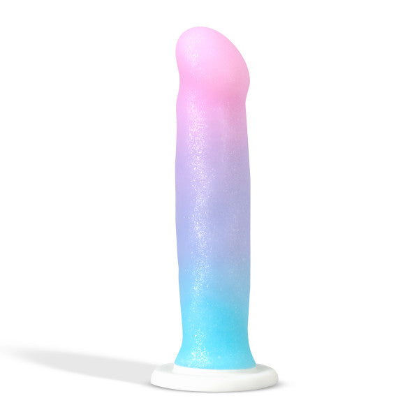 The unicorn colored Avant D17 Lucky Dildo standing upright on its suction cup.