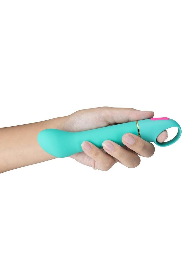 A hand holding the Aria Flirty AF Silicone Vibrator.