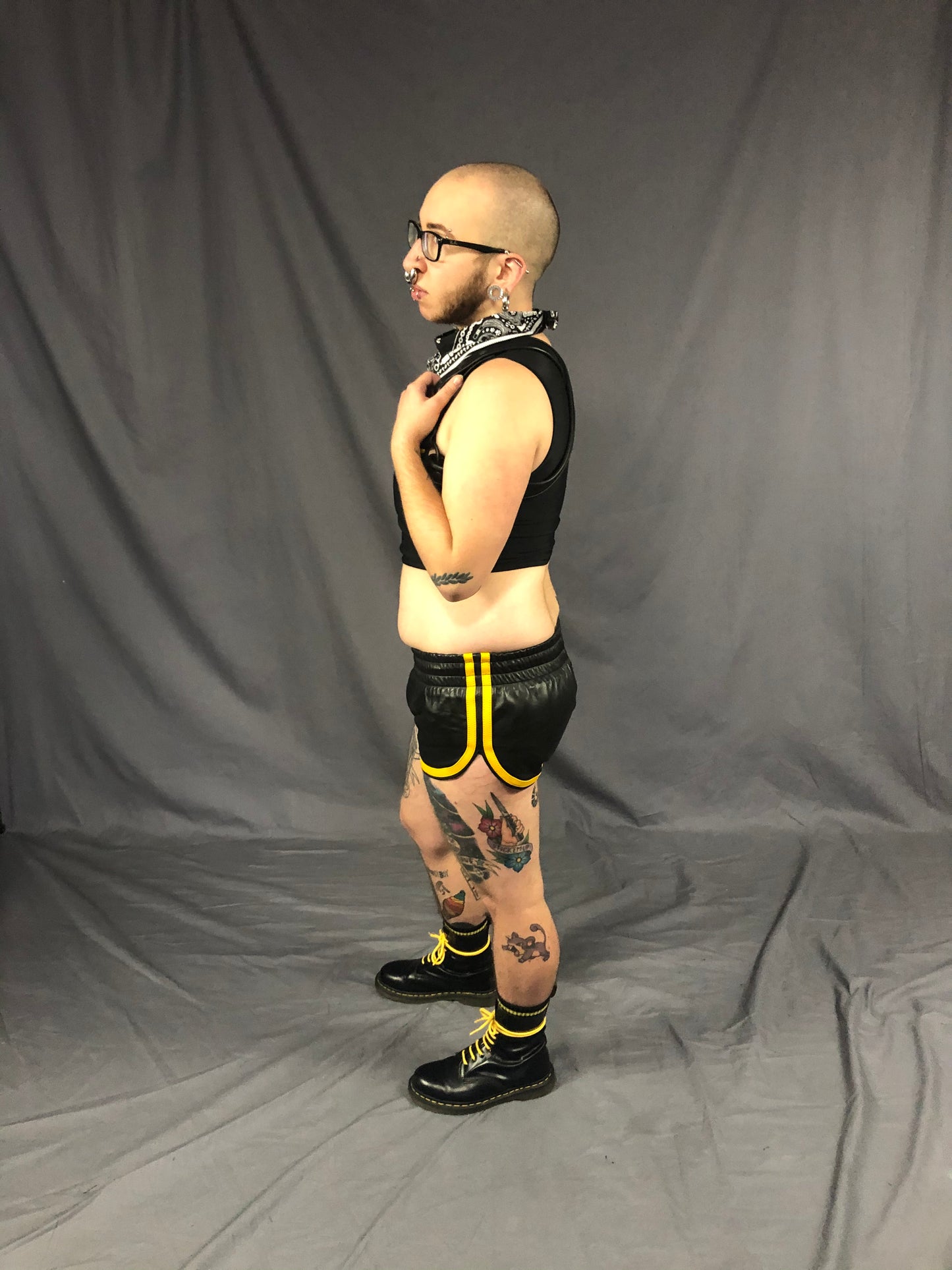 Left side view of the black and yellow prowler sport shorts.