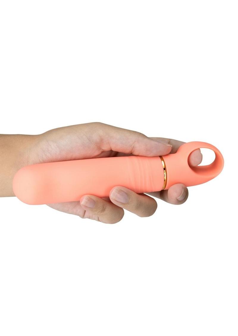A hand holding the Aria Smokin' AF Silicone Vibrator.