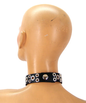 mannequin wearing black leather tentacle choker, showing back closure