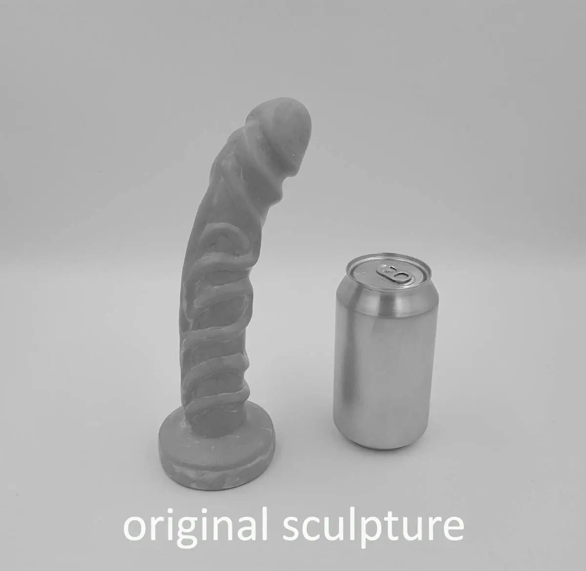Night King Dildo original sculpture standing vertically next to soda can for size comparison; photo is in gray scale