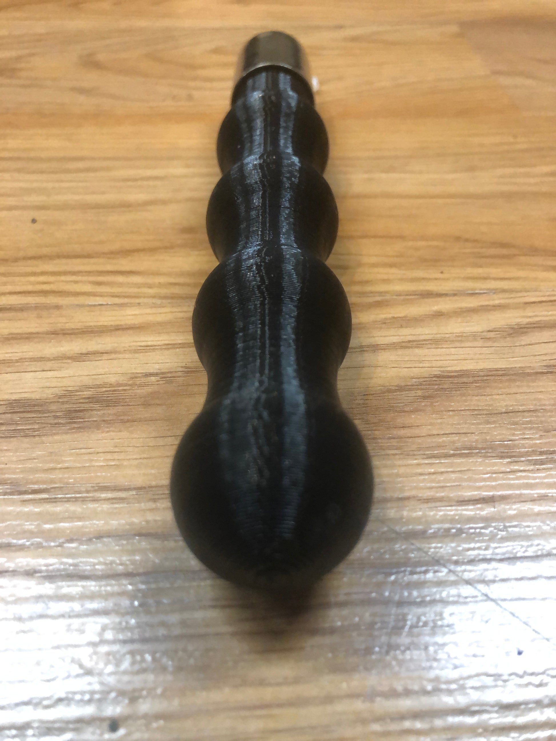 The butt end of the Flogger Handle.