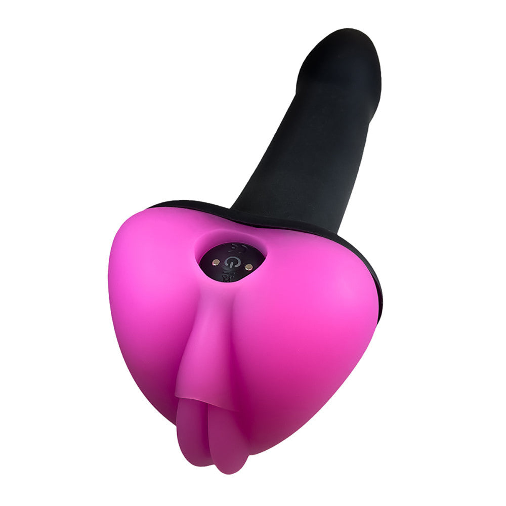 The pink Lippi Soft Silicone Dildo Base attached to a black dildo with a bullet vibrator inserted.