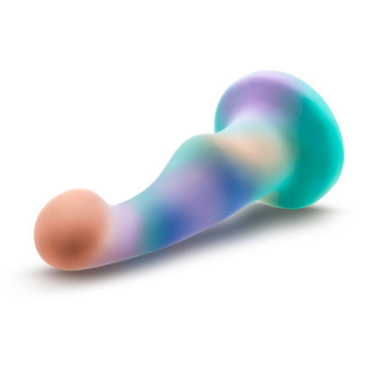 The unicorn Avant Opal Dreams Dildo lying on its side with the head pointed toward the front.
