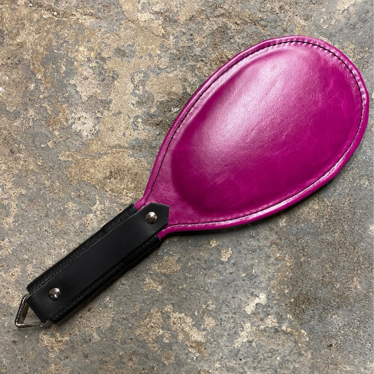 The pink Round Paddle with black handle.