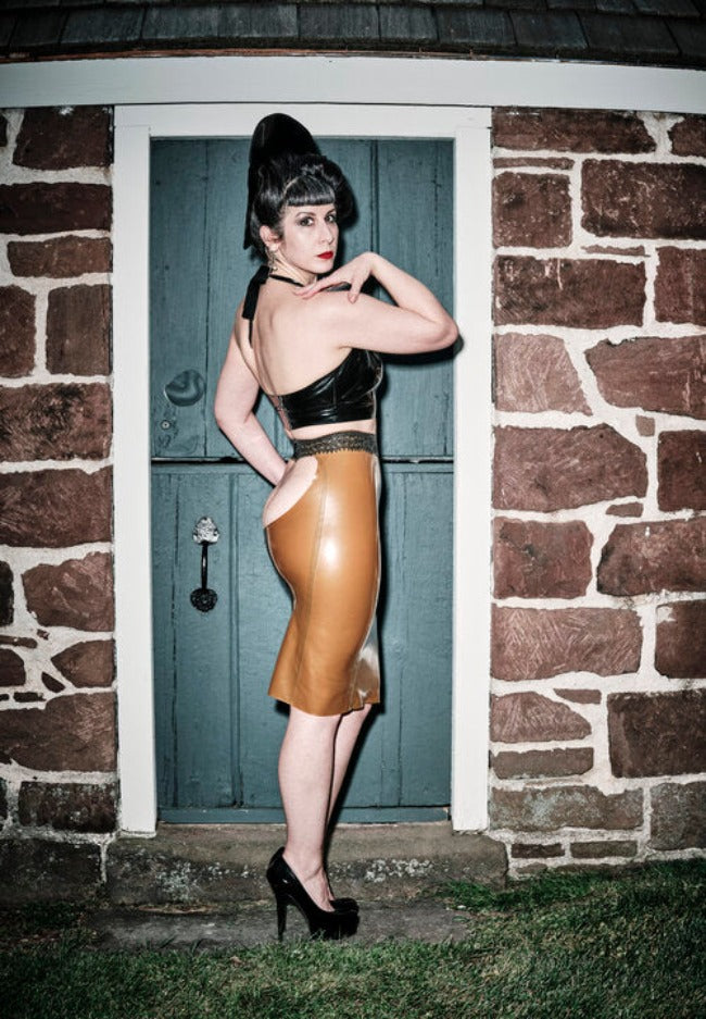 The right side of the Lace Trimmed Latex Peep Skirt.