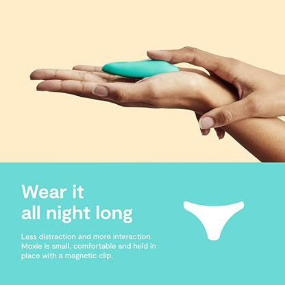 A handing holding the We-Vibe Moxie+ Wearable Clitoral Vibrator with a caption that says, "Wear it all night long, Less distractions and more interaction Moxie is small, comfortable and held in place with a magnetic clip".