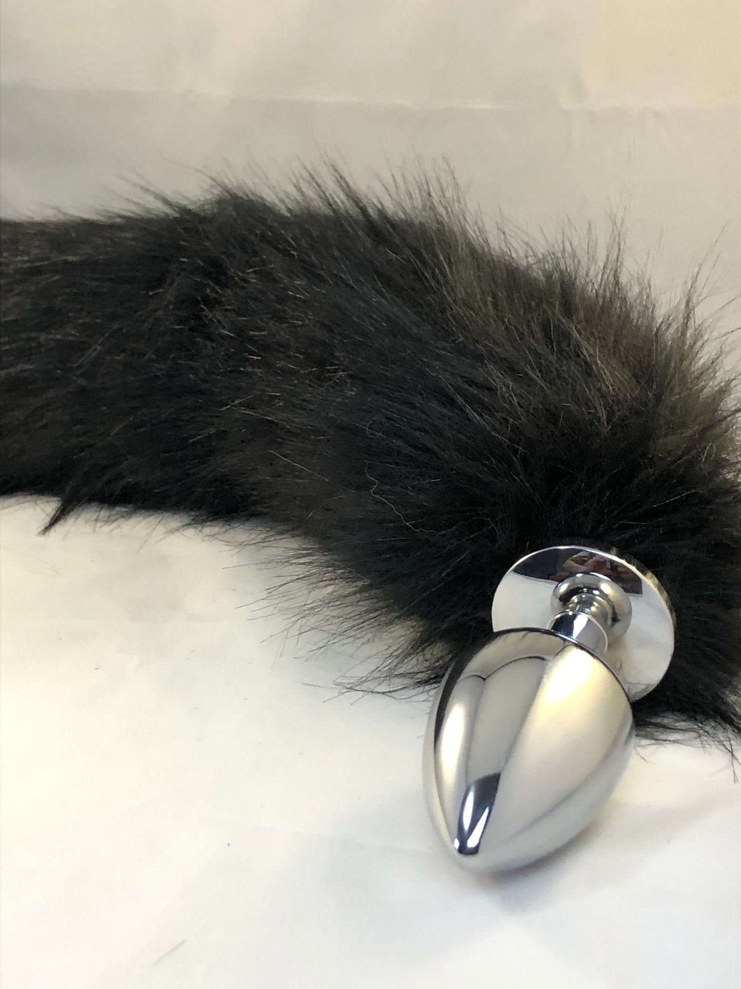 Faux black fur tail 