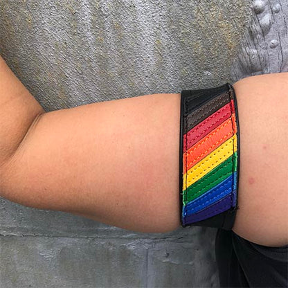 Model wearing Pride flag leather armband