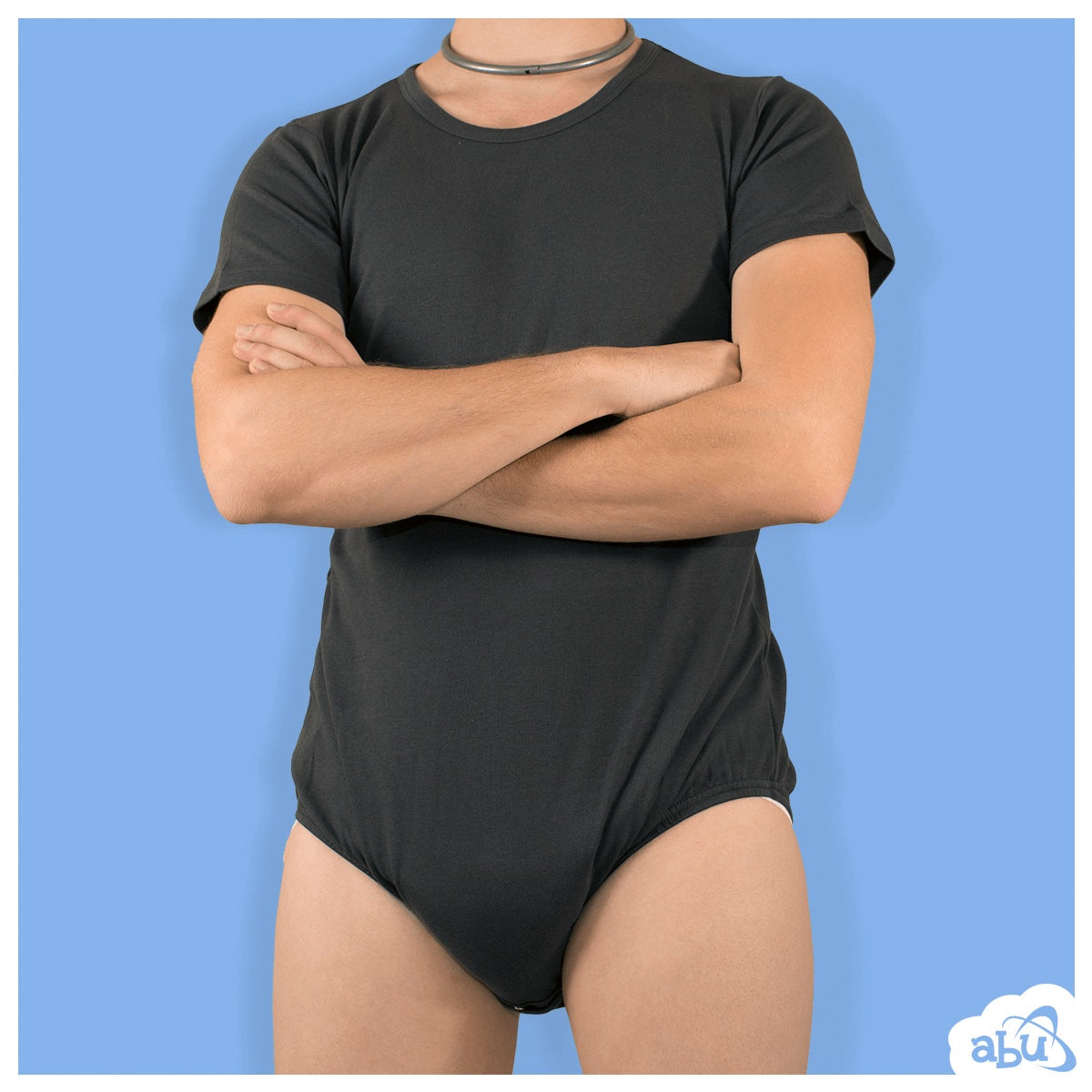 Model wearing black diapersuit with disposable diaper worn underneath