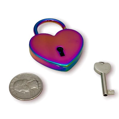 The rainbow Large Heart Lock and one key lying together with a quarter for size comparison