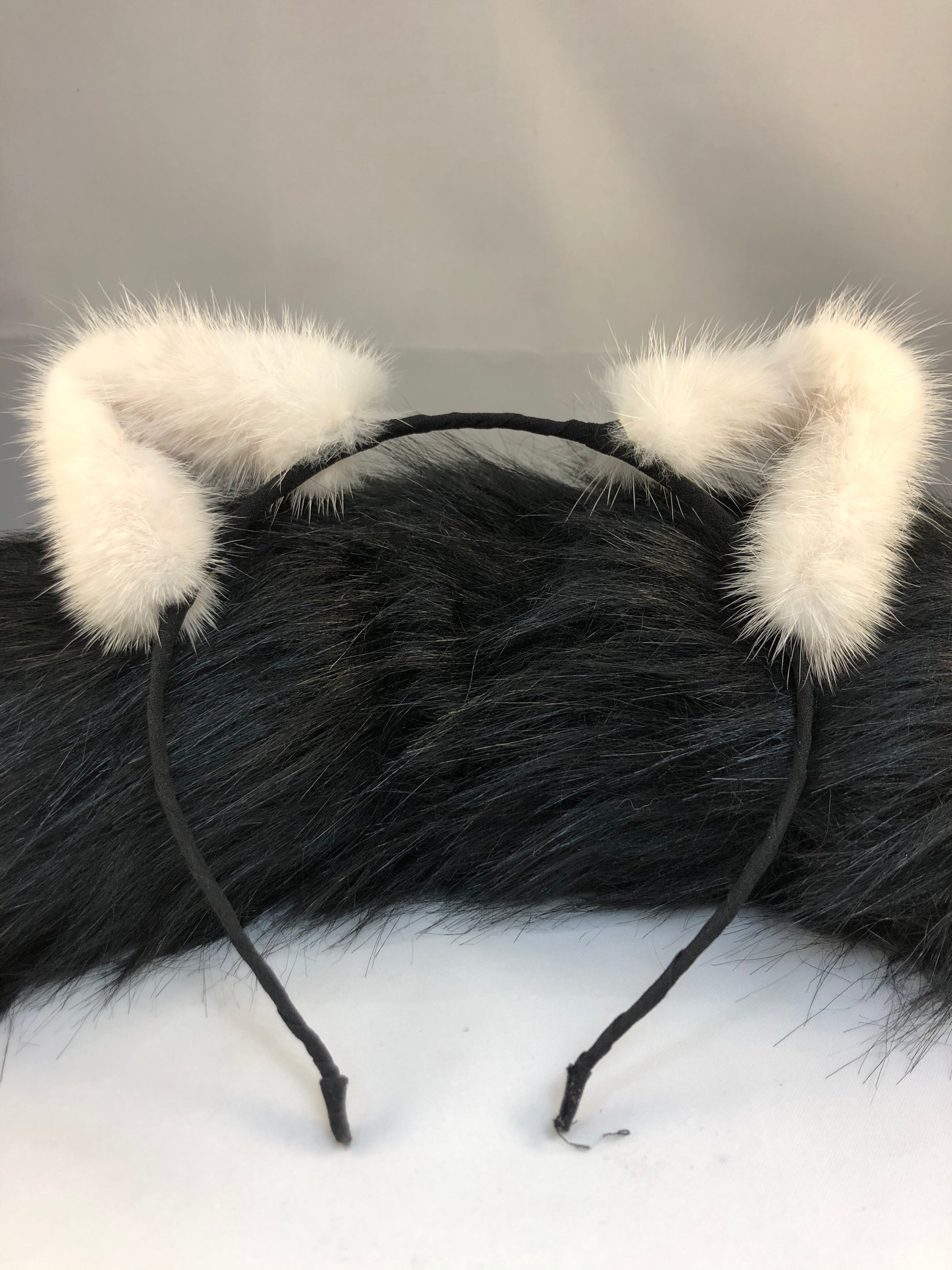 White mink fur headband.