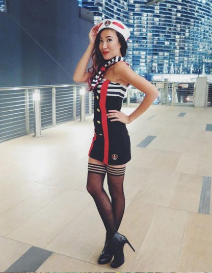 Ally Black Polka Dot Thigh Highs on model wearing sailor girl pinup outfit left side view