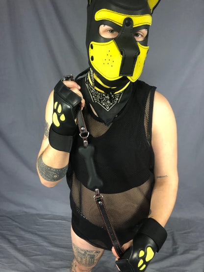 front view of black silicone bone gag being held by straps