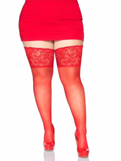 A model wearing the plus size red Sheer Stay Up Lace Top Thigh Highs with red mini skirt and red heels, front view.