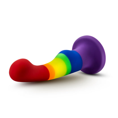 The Freedom Gay Avant Pride P/G-Spot Dildo laying on its side.