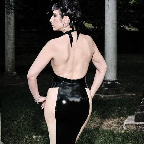 Model showing the back of the Black and Translucent Curvy Pencil Panel Skirt.