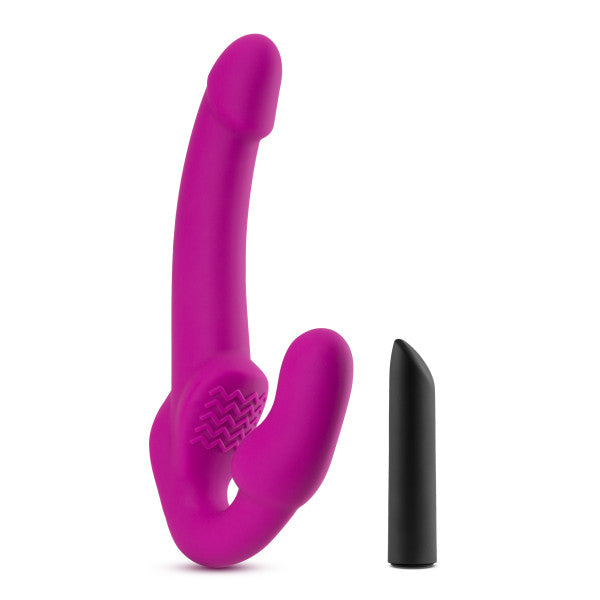 The Estella Pink Temtasia Double Strap-in Dildo sitting next to its black vibrating bullet.