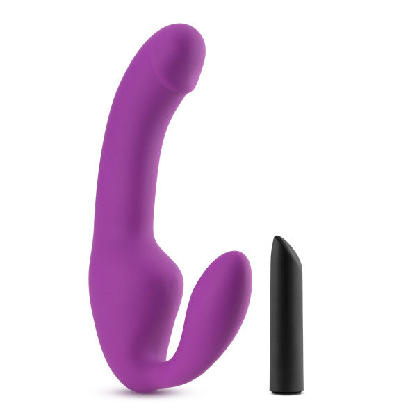The Cyrus Purple Temtasia Double Strap-in Dildo sitting next to its black vibrating bullet.