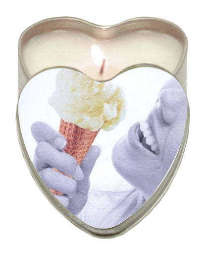 The Vanilla Earthly Body Edible Massage Candle open with its lid leaning on its side.
