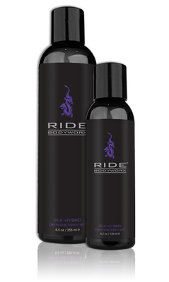 Two different sized bottles of BodyWorx Ride Silk Lubricant.