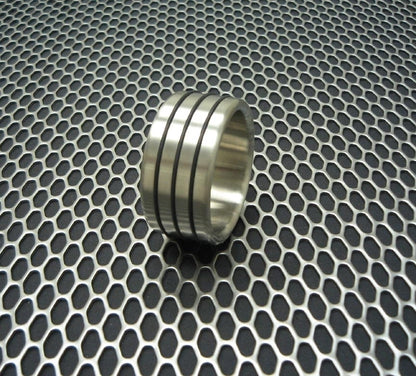 The Triple Accent Brushed Stainless Steel Cock Ring.