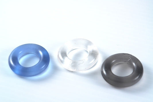 Donut Stretchy Cock Rings Blue, Clear, and Black.