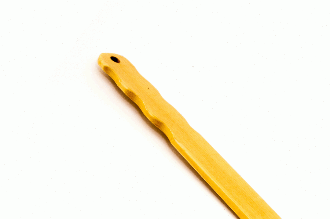 A close up of the handle of the Slapper Paddle.