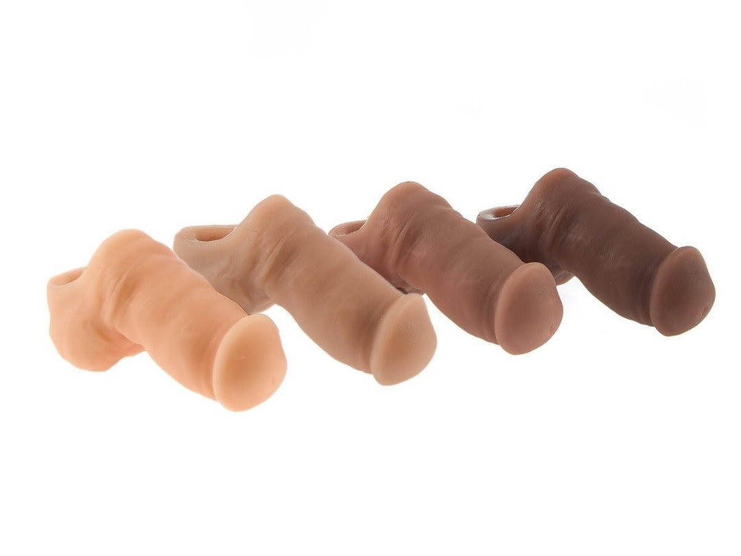 Another view of the four flesh colored Sam Stand to Pee Packer Penises.