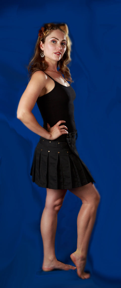 Side view of Pinstripe mini kilt with silver rivets and pleats.