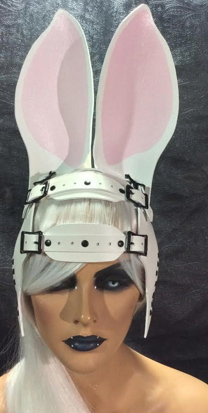 The front of the white with pink Bunny Harness on a mannequin head.