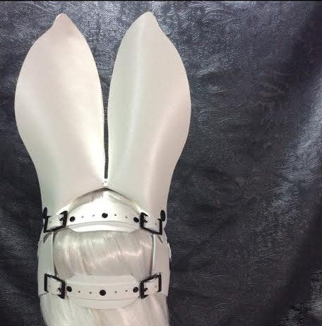The back of the white with pink Bunny Harness on a mannequin head.