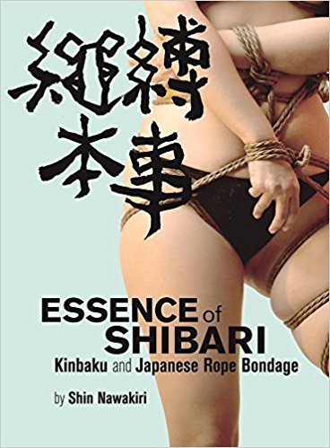 The front cover of Essence of Shibari - Shin Nawakiri. The lower torso and legs of a model tied with rope and the title of the book across the front in Japanese and English in black text.