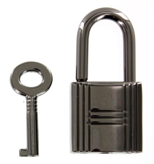 Gunmetal grooved padlock and key.