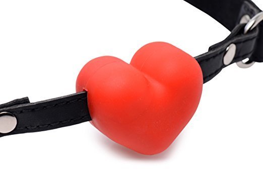 A closeup of the front of the Frisky Heart Beat Gag.