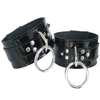 A pair of 2 Layer Leather Drop Ring Cuffs.