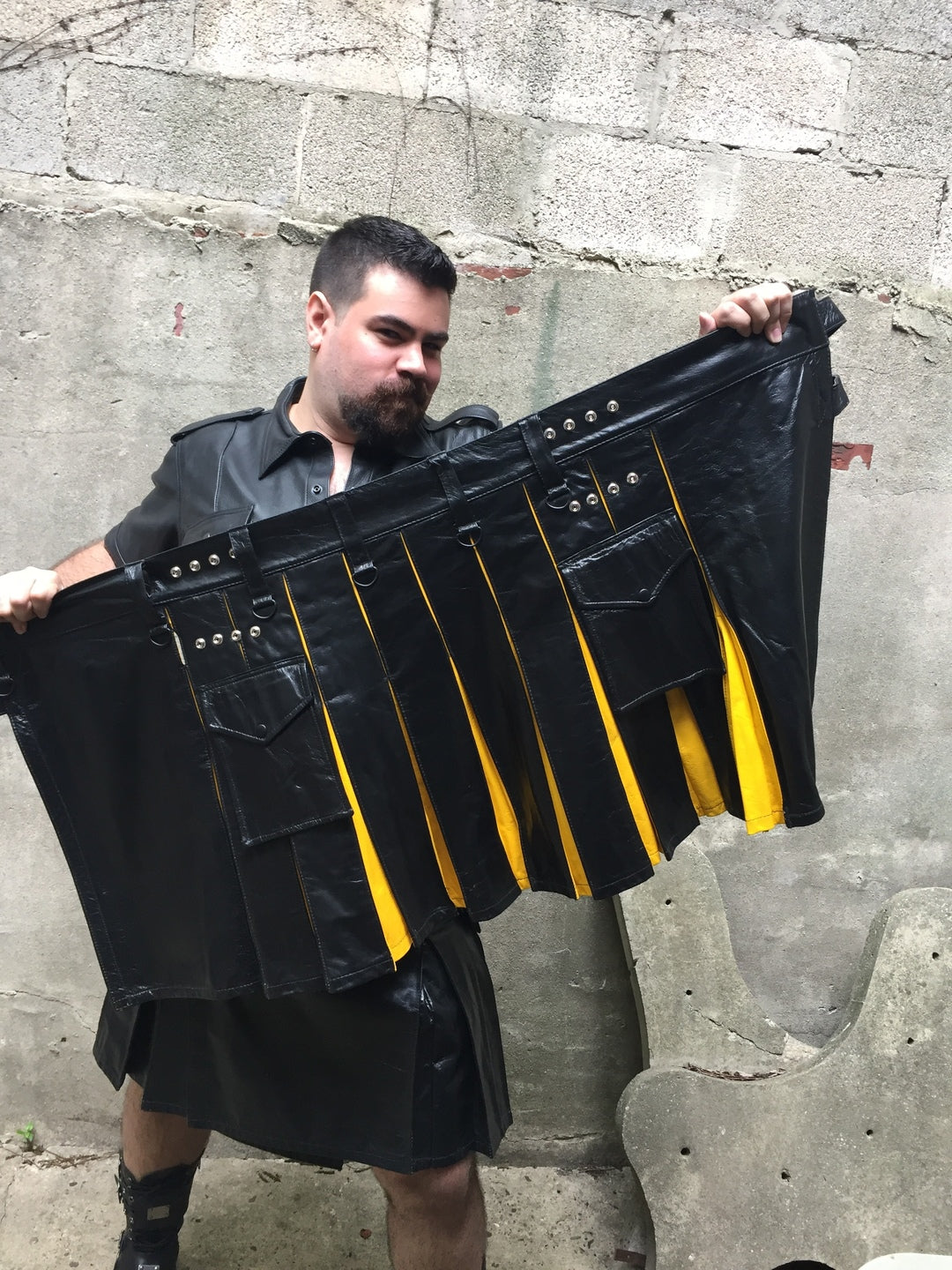   Contrast Pleat Cargo Kilt, black with yellow pleats.