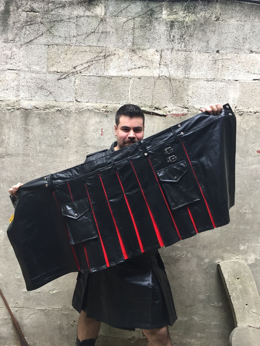 Cowhide Contrast Pleat Cargo Kilt, black with red pleats.