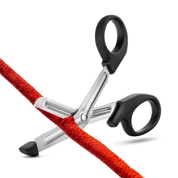 The Temptasia Safety Scissors cutting red nylon rope.