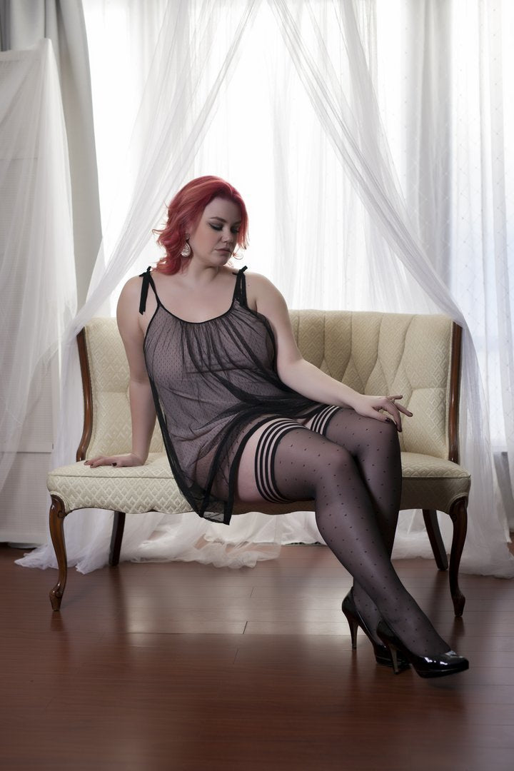 Ally Black Polka Dot Thigh Highs on seated model right side view