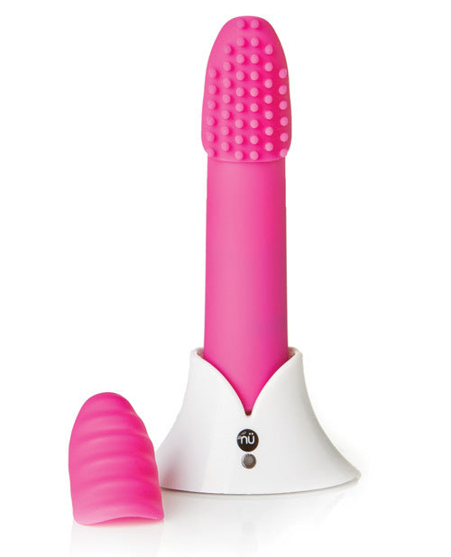 The pink Sensuelle Point Plus Vibrator with attachments in its stand.