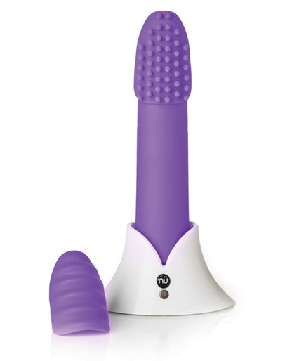 The purple Sensuelle Point Plus Vibrator with attachments in its stand.