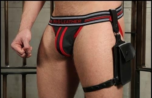 Jockstrap Holster Harness attached to a jockstrap and model's left leg.