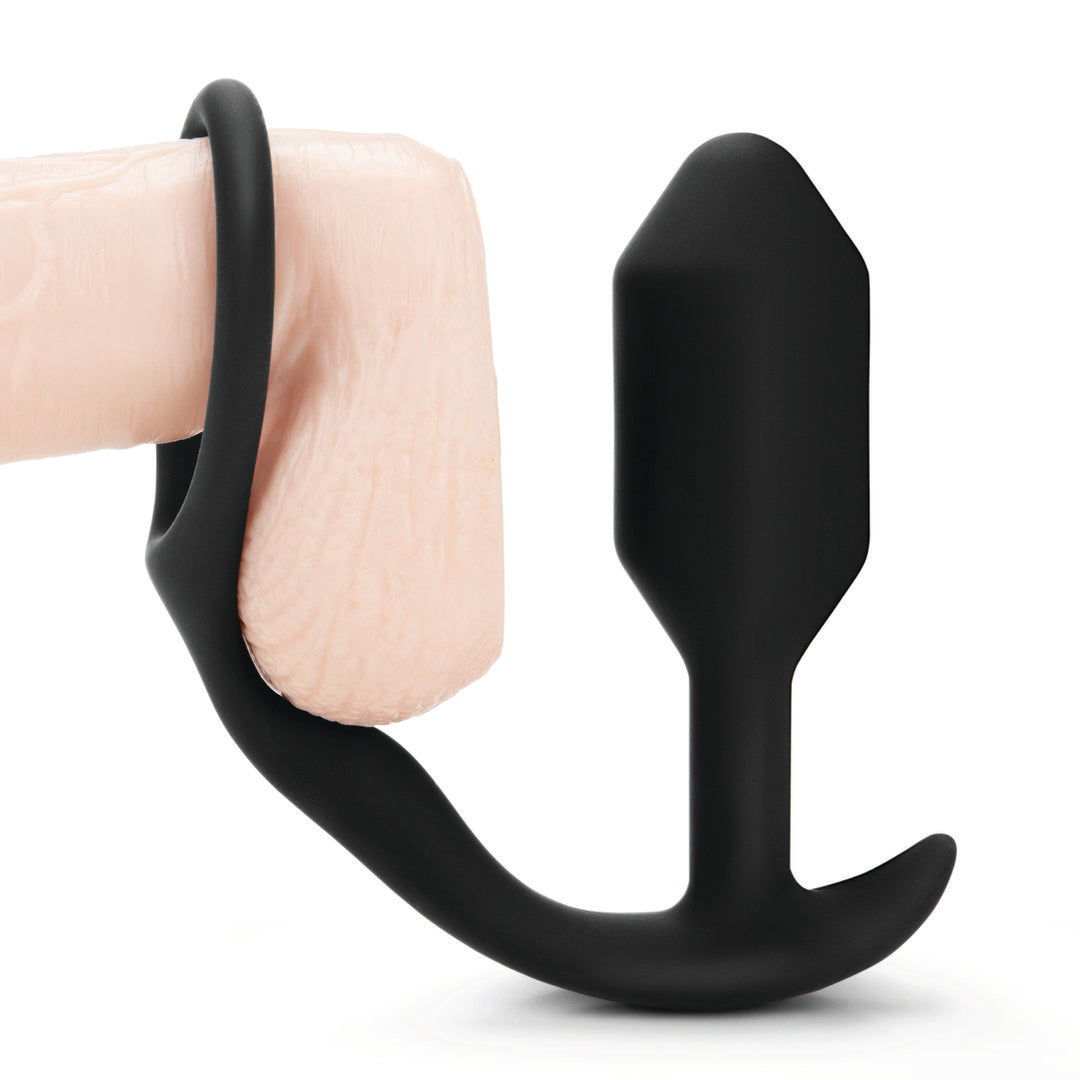 B-Vibe Snug & Tug Anal Plug and Cock Ring on dildo to demonstrate usage