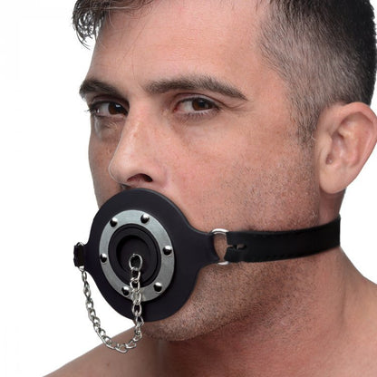 A model wearing the Pie Hole Silicone Feeding Gag.