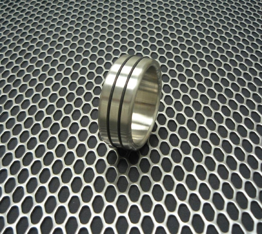 The Double Accent Brushed Stainless Steel Cock Ring.