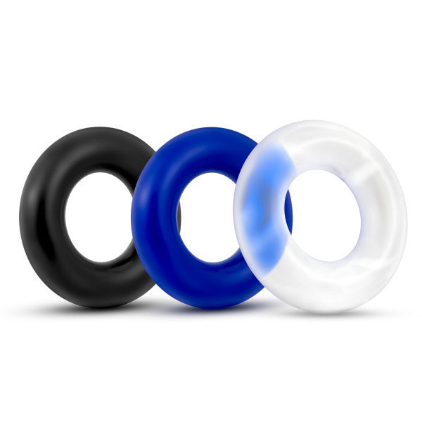 Donut Stretchy Cock Rings Blue, Clear, and Black Standing Vertically.