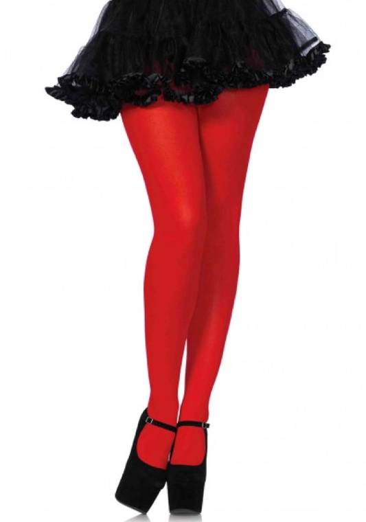 A model wearing the red Nylon Tights with a black petticoat and black platform heels.