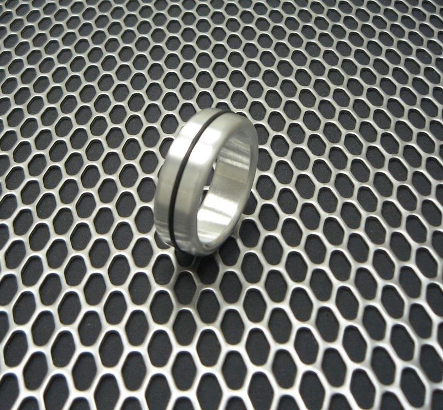 Accent Aluminum Cock Ring with one band.